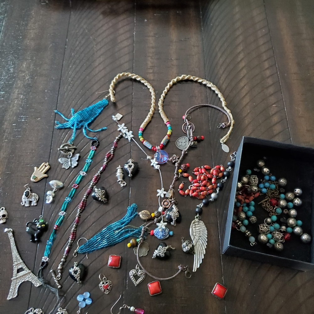 Lot of charms and beads. Great for making jewelry.